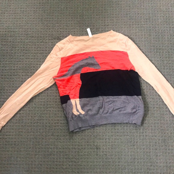 Cream coloured sweater. - Picture 1 of 2